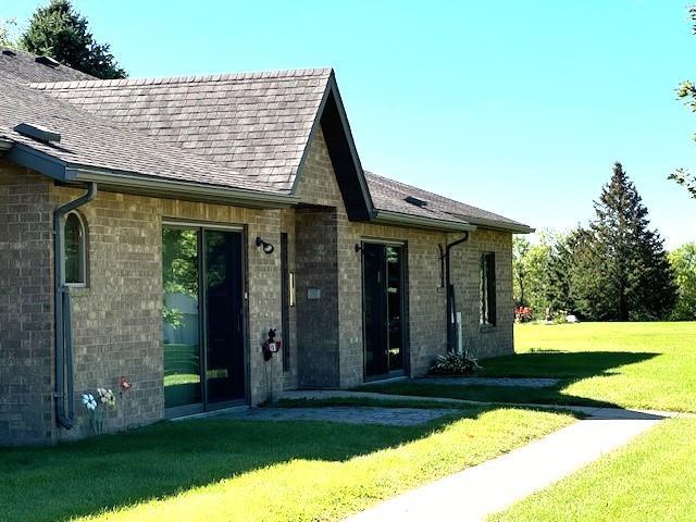 view of front of home with a front lawn