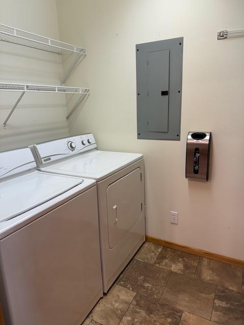 laundry area featuring separate washer and dryer and electric panel