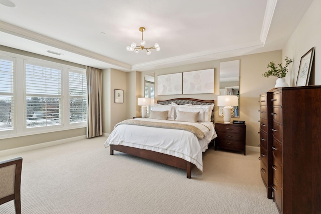 carpeted bedroom featuring a raised ceiling, crown molding, and a notable chandelier