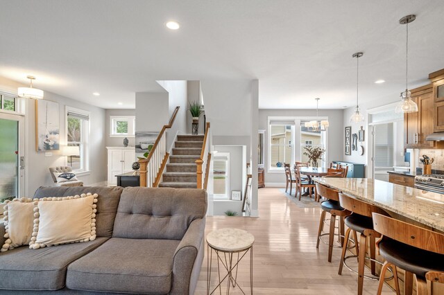 living room with light hardwood / wood-style floors