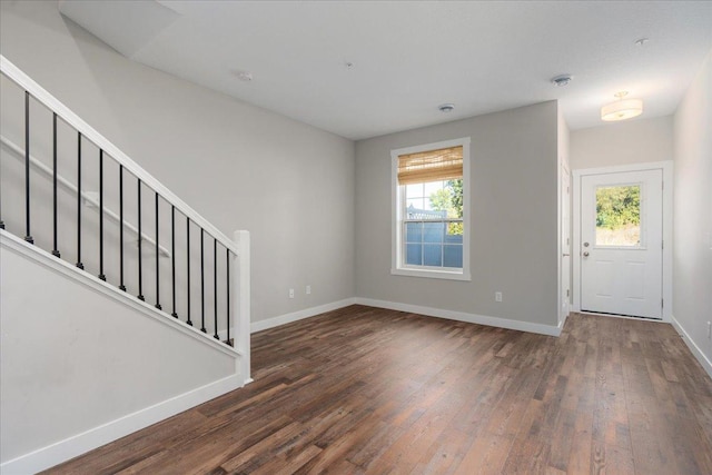 entrance foyer featuring dark wood-type flooring