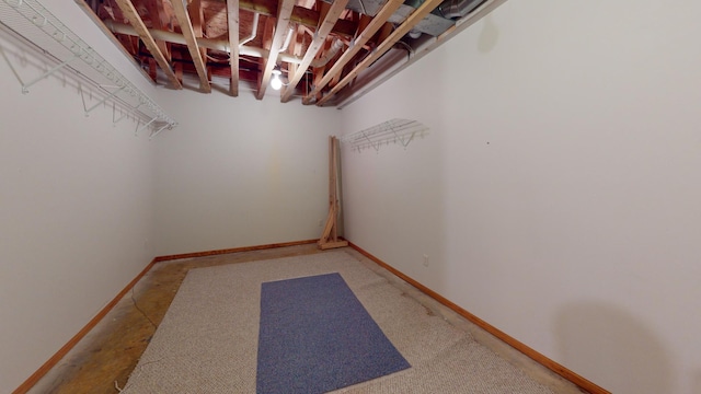 unfinished below grade area featuring baseboards