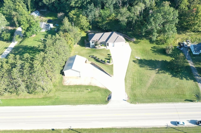 drone / aerial view with a view of trees