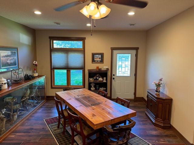 dining space with a ceiling fan, recessed lighting, baseboards, and dark wood-style flooring