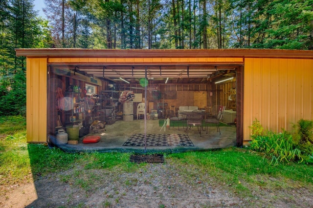 view of patio / terrace featuring an outbuilding and exterior structure