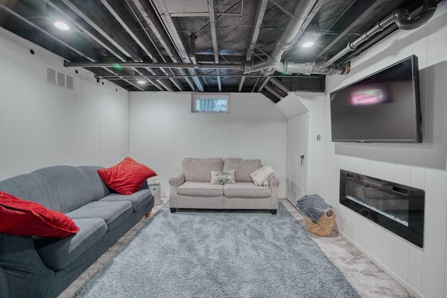 living area featuring visible vents
