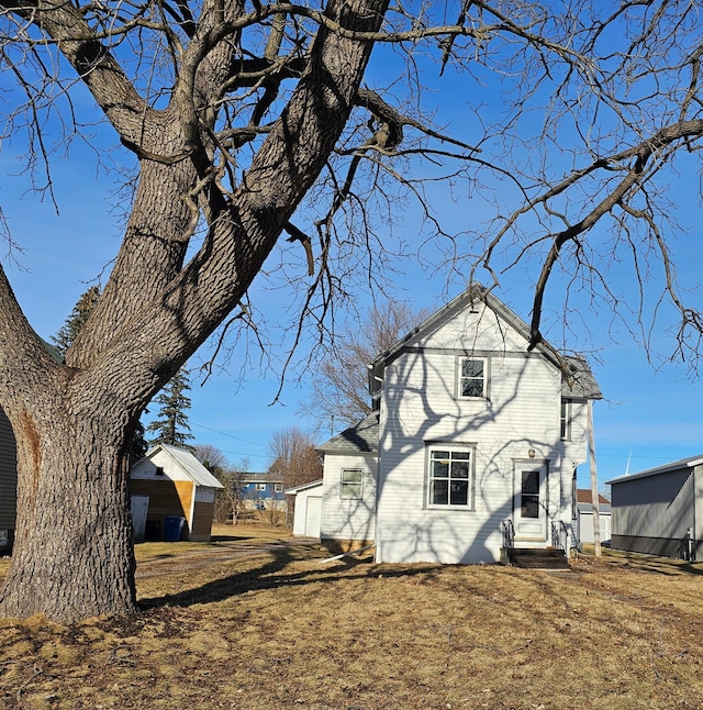 exterior space with an outbuilding