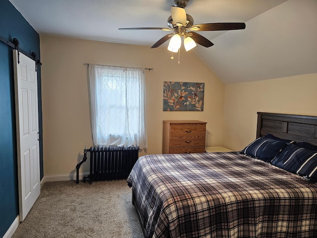 carpeted bedroom with radiator, a barn door, ceiling fan, and lofted ceiling