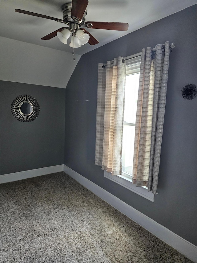 additional living space featuring ceiling fan and lofted ceiling