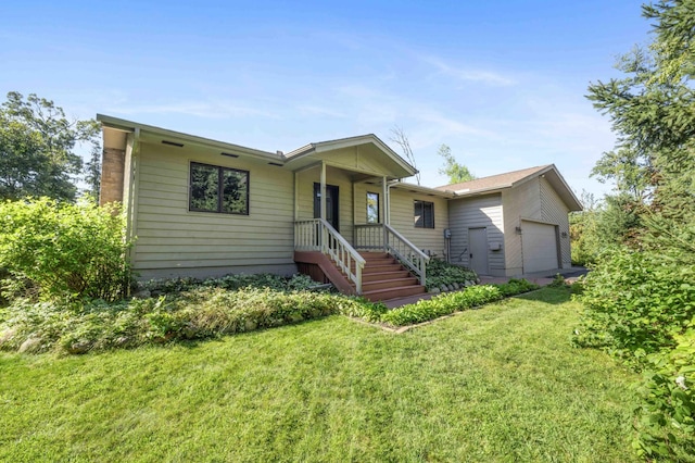 view of front facade with a front lawn and a garage