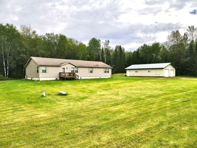 exterior space with a lawn and a deck