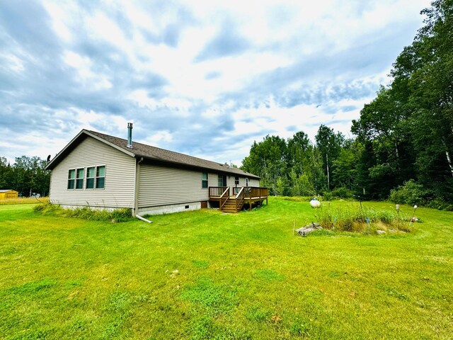 50370 Turtle River Rd, Marcell, MN 56628 - back of property with a wooden deck and a lawn