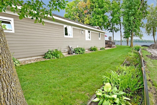 view of yard with a water view