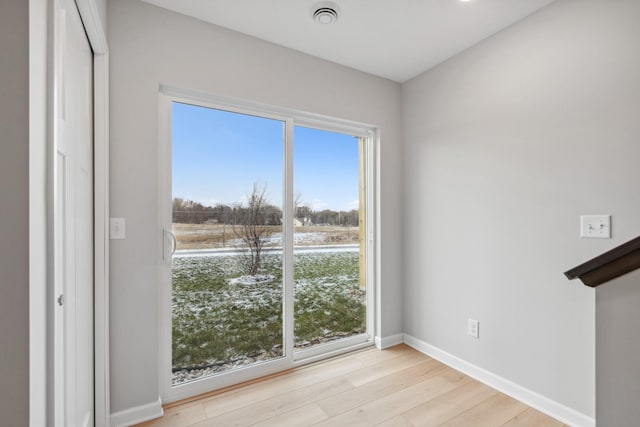 empty room featuring light hardwood / wood-style floors