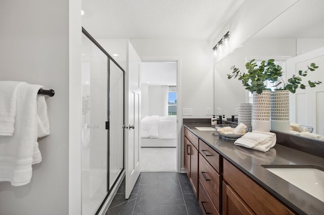 bathroom with vanity and walk in shower