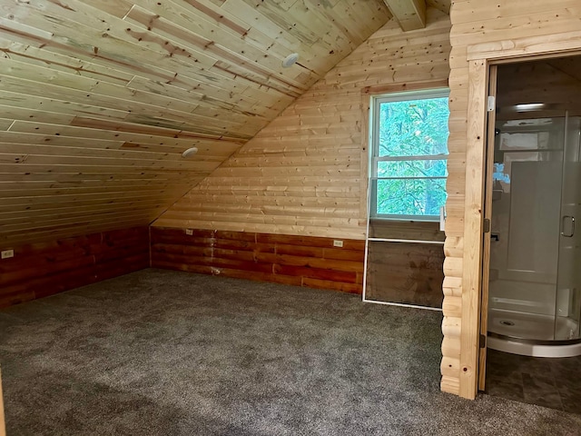 bonus room featuring wood ceiling, carpet flooring, wooden walls, and lofted ceiling