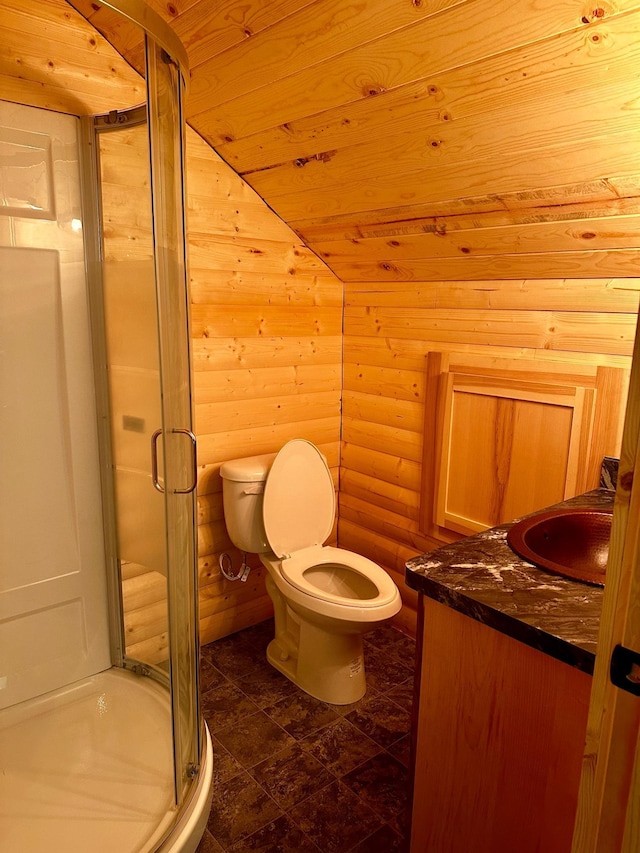 bathroom featuring vanity, toilet, and walk in shower