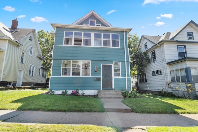 view of front facade with a front lawn