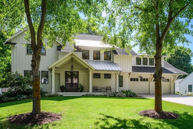 modern inspired farmhouse featuring roof with shingles, a front lawn, french doors, board and batten siding, and a standing seam roof
