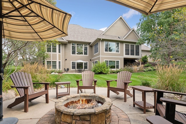 view of patio featuring an outdoor fire pit