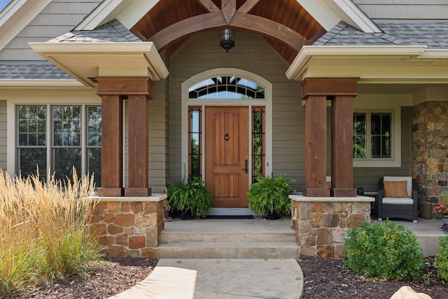 property entrance featuring covered porch