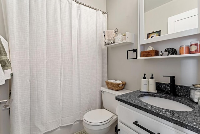 full bathroom with toilet, vanity, and shower / bath combination with curtain