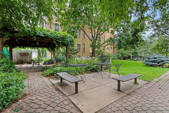 view of patio / terrace featuring fence