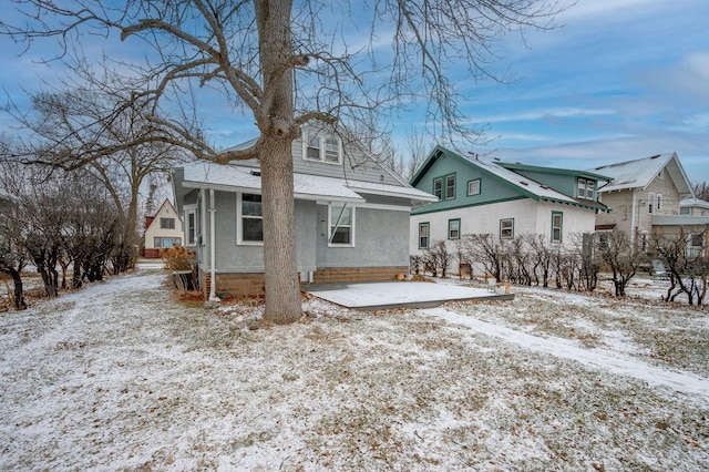 view of snow covered property