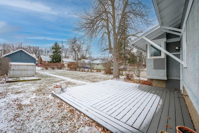 view of snow covered deck