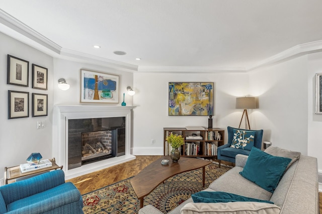 living room with ornamental molding and hardwood / wood-style floors