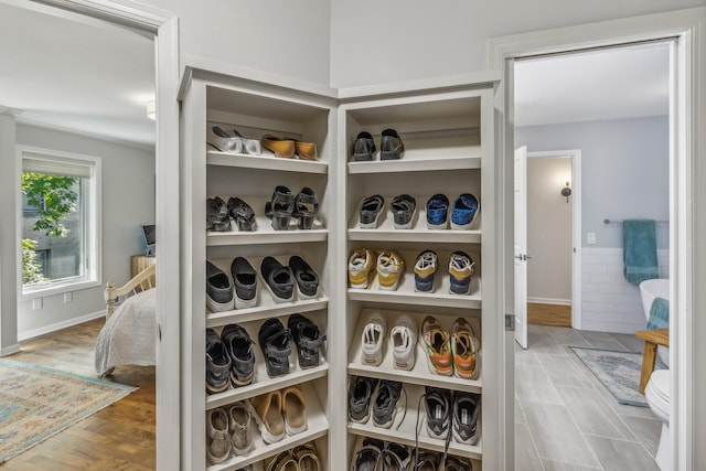 spacious closet featuring hardwood / wood-style floors