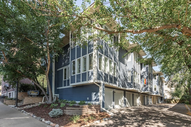 view of property exterior featuring a garage