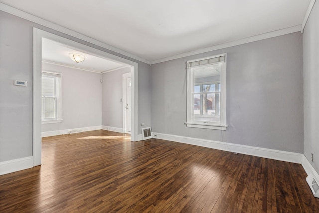 unfurnished room featuring crown molding and dark hardwood / wood-style flooring