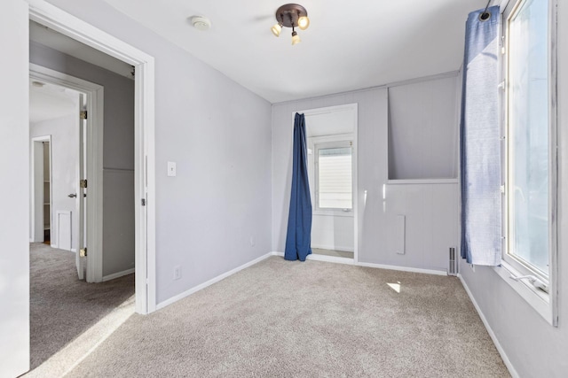 empty room with carpet flooring