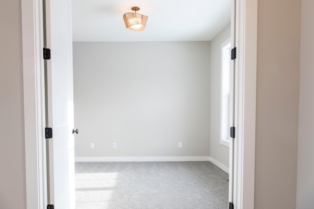 empty room with carpet flooring