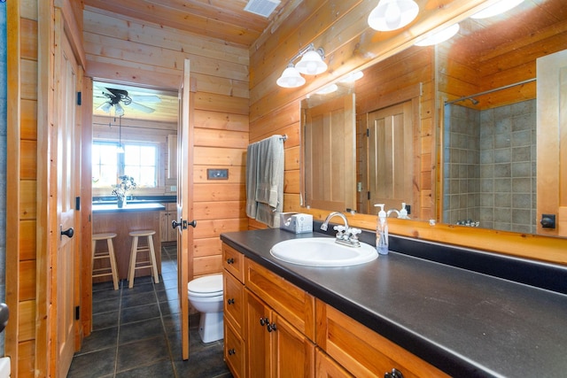 bathroom with wooden ceiling, toilet, a shower, wood walls, and vanity