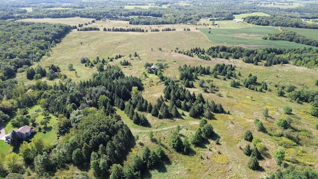 birds eye view of property featuring a rural view