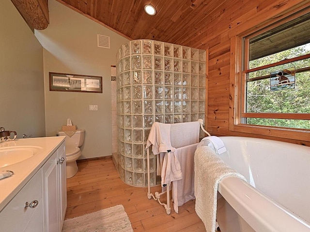 bathroom featuring toilet, a bathing tub, vanity, wooden ceiling, and hardwood / wood-style flooring