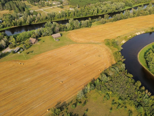 aerial view with a water view and a rural view