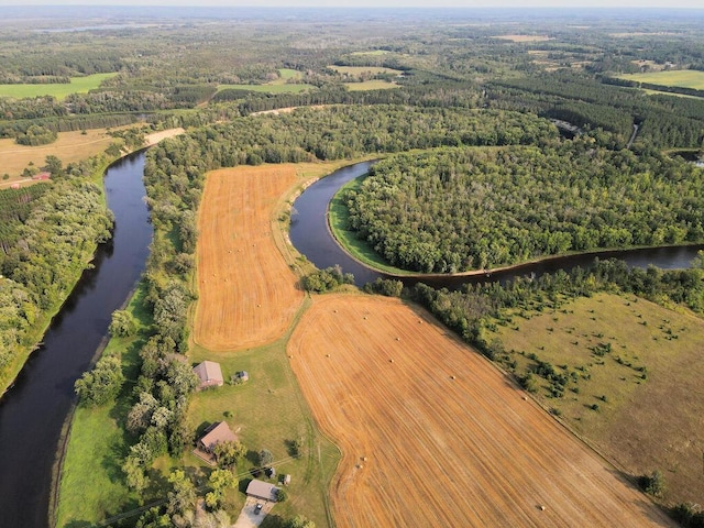 bird's eye view with a water view and a rural view