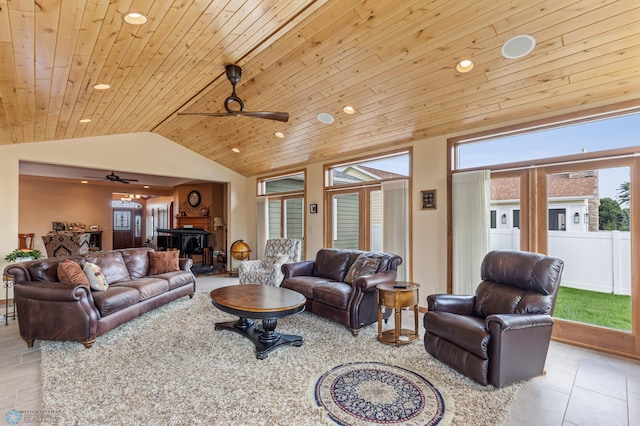 tiled living room featuring vaulted ceiling, ceiling fan, wood ceiling, and recessed lighting