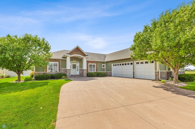 craftsman-style house with a garage, concrete driveway, stone siding, and a front yard