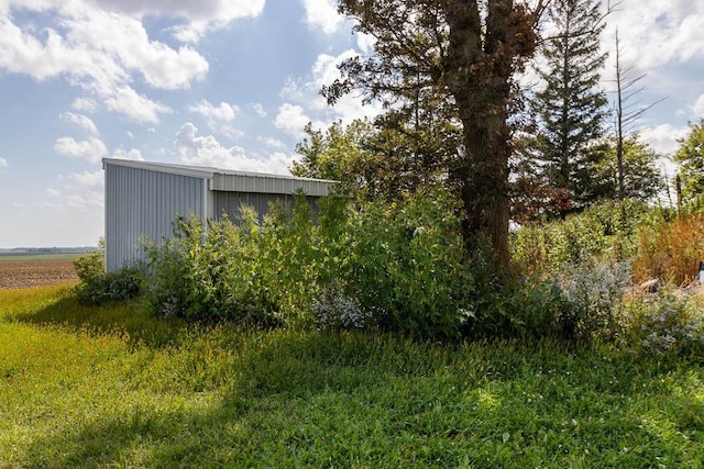 exterior space with a rural view