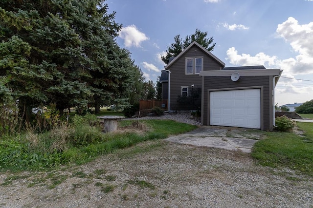 exterior space with a garage