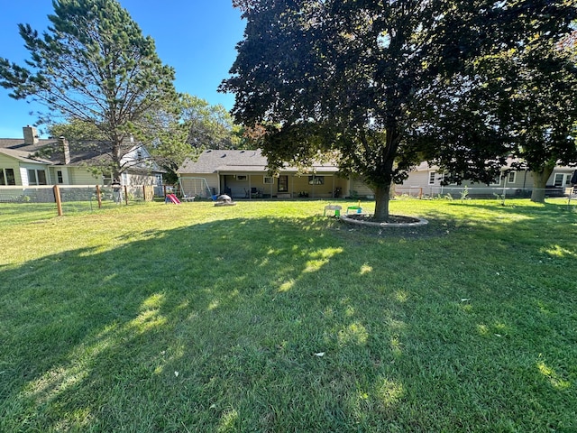 view of yard with a fenced backyard