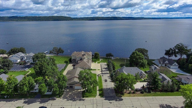 drone / aerial view featuring a water view