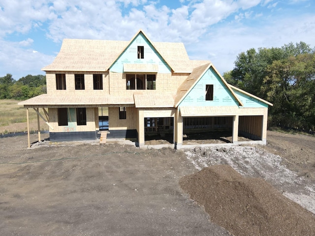 property in mid-construction featuring covered porch