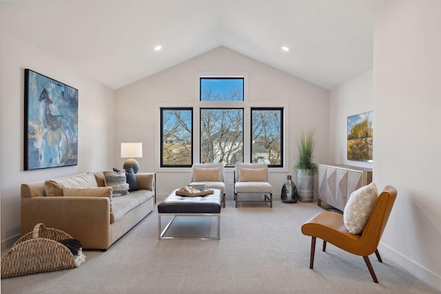 carpeted living area featuring vaulted ceiling, recessed lighting, and baseboards