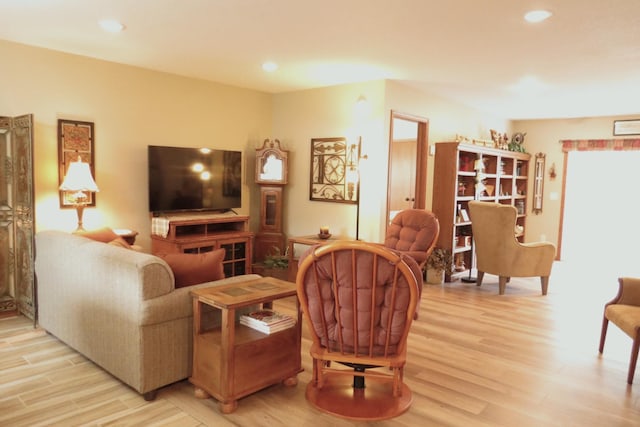 living room with light hardwood / wood-style floors