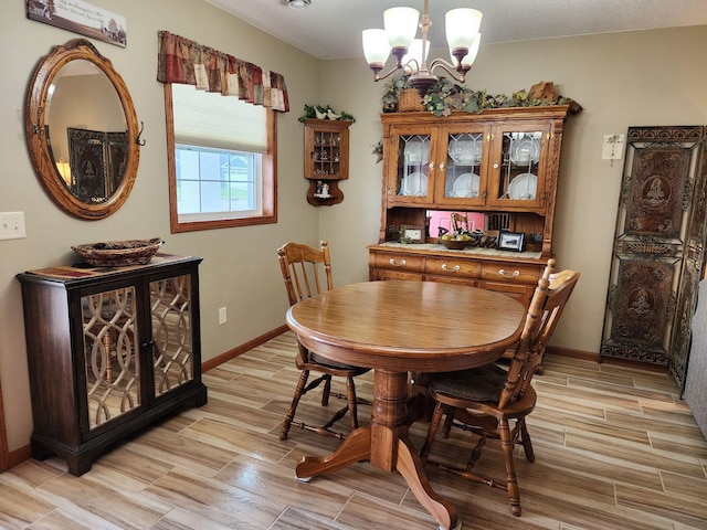 dining room featuring a notable chandelier